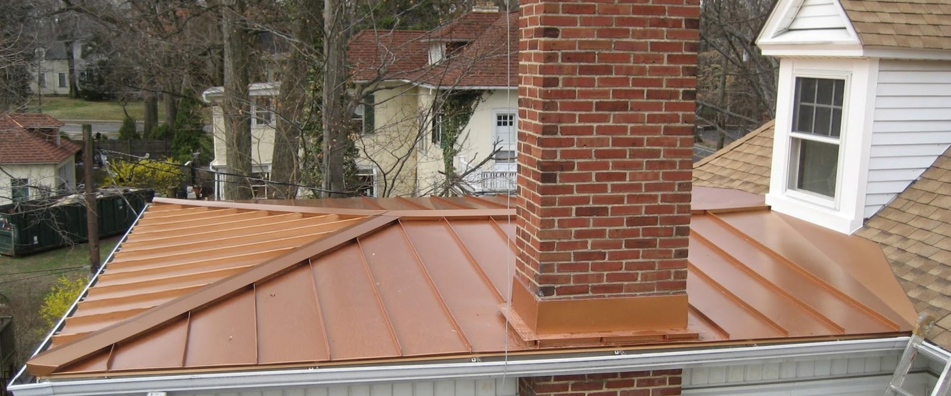What is the cheapest material for a flat roof?